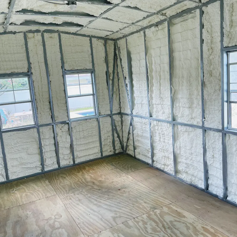 Closed-cell spray foam insulation applied to wall cavities in a residential project in Peoria